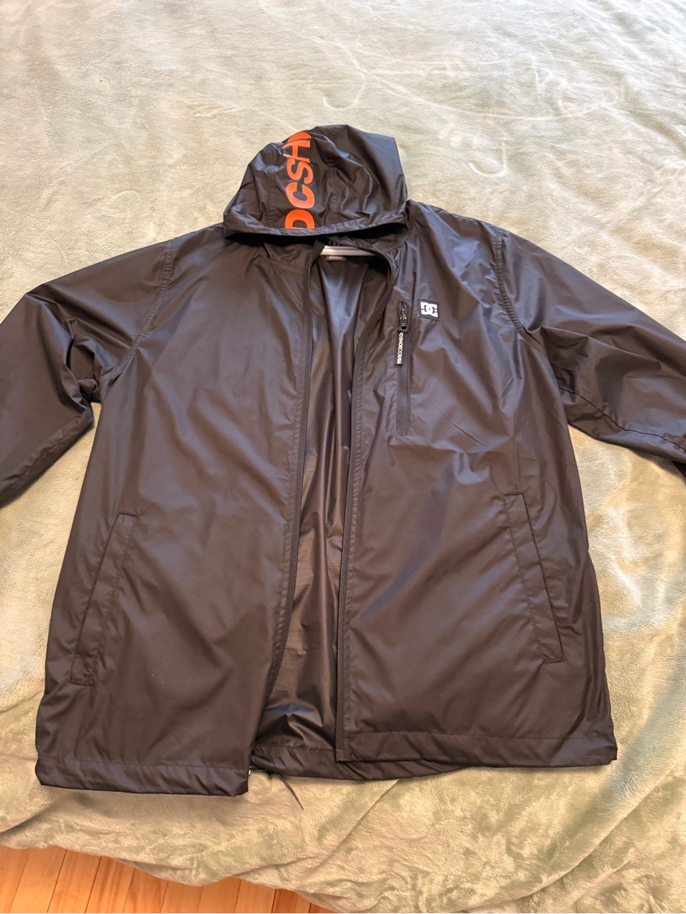 DC Black Hooded Raincoat with Orange Logo